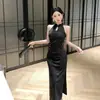 Cheongsam ajustado de estilo chino de alta gama, nuevo, con relieve brillante, transfronterizo, un vestido de noche sexy y de corte entallado para mujeres jóvenes