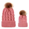 Comercio exterior europeo y americano en otoño e invierno gorro tejido de punto de bola retorcida cálido para mujer padre-hijo imitación bola de pelo de mapache gorro de lana