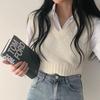 Chaleco de punto con cuello en V estilo universitario para mujer, otoño 2023, nuevo chaleco exterior corto sin mangas apilado