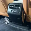 Adecuado para 26 Chery ICAR V27 rejilla de ventilación interior modificación ABS, panel de rejilla de ventilación anti-patada de cobertura completa para reposabrazos trasero