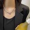 Collar de cadena de amor rosa con costuras de perlas de diseño de nicho para mujer, nuevo estilo, dulce y moderno, cadena de clavícula de alta gama.