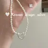 Cadena para Clavícula Estilo Ins de Lujo Accesible Coreano Plata de Ley S925 Corazón Hueco Collar de Perla Natural Elegante y de Gama Alta para Mujeres