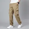 Calças de trabalho transfronteiriças da fábrica de origem, novas calças casuais masculinas de primavera e outono, tamanho extra, folgadas, roupas de trabalho plus size