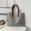 Bolso sencillo estilo occidental para mujer 2024 primavera nuevo bolso para portátil versátil Gran capacidad bolsa de mano para estudiante clase