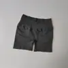 Pantalones cortos de fitness sin costuras de tres puntos europeos y americanos para mujer, pantalones cortos deportivos de cintura alta para levantar glúteos tipo durazno con cintura cruzada delantera, pantalones cortos de yoga