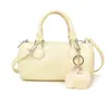 Bolso de mano cilíndrico simple estilo Ins para mujer, gran capacidad, bolso de hombro moderno y versátil, bolso cruzado casual de cuero suave