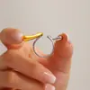 Rueda de la fortuna estilo punk combinación geométrica de colores anillo abierto femenino joyería exagerada transfronteriza europea y americana acero de titanio chapado en oro de 18 quilates