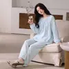 Pijama de Mujer Otoño/Invierno 2026 Estilo Nuevo Engrosado Manga Larga Ropa de Casa De Rong Se Puede Usar al Aire Libre Conjunto de Dos Piezas Alta Gama