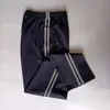 Calça Cinza Fina de Verão com Listras Finas Refletivas para a Escola