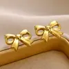 Europa y Estados Unidos nuevo anillo de lazo chapado en oro de 18 quilates acero inoxidable simple moda Joker anillo fabricantes venta al por mayor