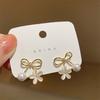 Pendientes de plata S925 con forma de flor de lazo de Corea del Sur, de alta calidad, ligeros, de lujo, con temperamento de celebridades de Internet, venta al por mayor, fábrica