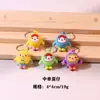 Agujero de spot caja ciega de música muñeca accesorios pequeños huevo Sanrio kulomi dios original llavero pequeño regalo colgante