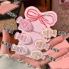 Puestos de explosión de celebridades de internet en el mercado nocturno patrón de un dólar accesorios para el cabello pasador lindo dibujos animados infantiles fruta tocado para flequillo venta al por mayor