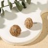 Aretes de paja con girasoles de estilo vacacional costero de primavera, nicho femenino de diseño de temperamento versátil, nicho exagerado para las orejas