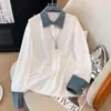 Nova camisa branca com retalhos de manga longa, design de nicho 2026, elegante e que afina a silhueta, top versátil para mulheres na primavera e no outono