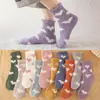 Meias de coral fleece até a panturrilha inverno atacado Femininas forradas com fleece espessadas em formato de coração não soltam fiapos meias toalha meias de chão para casa