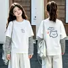 Camiseta de manga larga de algodón puro para niñas, top base elegante y moderno para niños, adecuada para primavera y otoño de 2026, con un diseño de imitación de dos piezas
