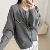 Cárdigan de punto con bloques de color estilo tweed color mapache para mujer, nueva colección otoño/invierno 2026, suéter de manga larga con bolsillos falsos