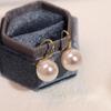 Pendientes de perla rosa transparente estilo diosa japoneses Pendientes retro franceses Pendientes de lujo ligero de alta calidad Gancho de oreja de perlas con abalorios