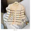 Cárdigan de punto de manga larga a rayas con bloques de color y cuello redondo estilo coreano para mujer, nueva chaqueta superior casual ajustada para otoño de 2026