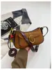 Bolso de axila versátil retro de nicho estilo coreano 2026 nuevo modelo de nicho de alta gama versátil para el trabajo bandolera para mujer
