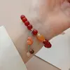Pulsera original de ágata roja de moda nacional Colgante de calabaza de jade dorado y orquídea de perla Joyería al por mayor