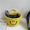 Cesta de almacenamiento tejida de hilo de algodón con cara sonriente colgante, cesta de almacenamiento para refrigerios y cosméticos, almacenamiento de artículos diversos junto a la cama para juguetes infantiles