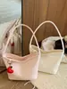 Bolso Tejido de Gran Capacidad para el Trabajo Diario 2026 Verano Nuevo Bolso de Hombro de Alto Valor Bolso Cubo de Estilo Relajado y Moderno