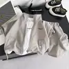 Conjunto de Ropa de Verano para Niños 2027 Nuevo Elegante Estilo Coreano Ropa de Trabajo de Verano para Bebé Conjunto de Tres Piezas de Manga Corta Conjunto Infantil Moderno