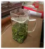 Taza de vidrio de borosilicato de alta resistencia a la temperatura en forma de media luna Filtro de rodaja de media luna integrado Taza para té verde Curva de media luna Filtro Mango de madera público