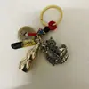Nuevo colgante de calabaza de cobre retro doble palillos giratorio dinero llavero tejido a mano cinco emperadores dinero colgante coche llavero colgante