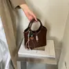 Elegante bolso de mano estilo coreano para mujer, nuevo diseño de nicho 2026, bolso de hombro cruzado, bolso de moda para el día a día