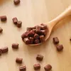 Importados de Japón Meiji Baby Mini Frijoles de Chocolate con Leche Mini Paquete Pequeño Caja de Snacks para Niños