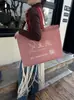 Bolsa de Tela No Tejida Gruesa de Moda Tridimensional para Tienda de Ropa de Mujer y Niño Bolsa de Mano Bolsa de Compras Logo Personalizado