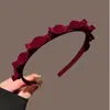 Diadema de esponja roja de estilo Año Nuevo, diadema de cuero de alta calidad con parte superior craneal alta, accesorios para el cabello para mujer, nuevos y sencillos que combinan con todo.