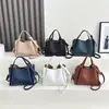 Bolsas de Cuero Suave Nuevas Otoño/Invierno 2025 Bolso Cubo de Alta Gama Moderno Gran Capacidad Bolso de Mano para Viajes Diarios Bolso de Hombro