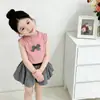 2026 Nuevo Conjunto de Falda a Cuadros Dulce de Verano Chaleco Versátil Elegante Camiseta para Niña Falda Corta Floral
