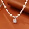 Popular Manta Rose Azúcar Perlado Cubo Circonita Colgante Collar Lujo Ligero Moda Gama Alta Elegante Temperamento Cadena Clavicular