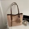 Bolso de Paja Tejida para Vacaciones en la Playa para Mujeres 2025 Nuevo Popular de Gran Capacidad Bolso de Hombro Moderno Bolso Tote de Moda para el Trabajo