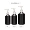Botella dispensadora con bomba de loción acondicionadora de 300 ml en stock, Botella de empaque para gel de ducha y champú de 500 ml negra esmerilada