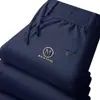 Fabricante Original 2025 Pantalones Deportivos para Hombre Otoño e Invierno Nuevos Rectos Deportivos Versátiles Forrados de Felpa Engrosados Modernos Pantalones de Chándal