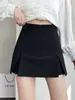 Falda asimétrica de verano con abertura y diseño único, estilo coreano nicho, falda bodycon de cuero versátil ajustada, falda corta negra para mujer