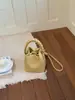 Bolso de Mano de Alta Gama para Mujer de Comercio Exterior Transfronterizo, Nuevo Bolso Cubo Texturizado de Moda, Elegante Bolso Cruzado de un Solo Hombro, Moderno