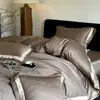Estilo de lujo ligero, color liso, juego de cuatro piezas de algodón Tencel 100S, funda de edredón y sábana de algodón puro y seda helada, ropa de cama de alta gama para primavera y verano