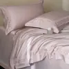 Al por mayor Estilo Minimalista Italiano Color Sólido Encaje de Gama Alta Ultra Suave Ropa de Cama Tencel Algodón Juego de Cuatro Piezas Textil para el Hogar Kelly 1