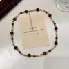 Elegante Collar Maillard de Piedra Ojo de Tigre, Sensación de Lujo Ligero de Alta Gama, Cadena de Suéter con Textura en Capas de Cuentas Grandes y Pequeñas