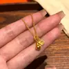 Libro rojo pequeño con collar de calabaza de oro antiguo, nuevo colgante de oro minimalista de la suerte para mujer, venta al por mayor