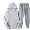 Conjunto de sudadera de color liso de talla grande para hombre y mujer, 220 g de tela, fabricante mayorista, conjunto holgado de talla grande de marca de moda para parejas