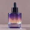Botellas de vidrio para aceites esenciales transparentes de hombro plano personalizadas con acabado de spray, botellas dispensadoras de muestras de sérum, proceso de electrochapado de color de spray disponible
