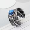 Anillo de plumas con gemas que abren los ojos mágicos retro, hechizo de una gran cantidad de envíos de una generación de joyería de comercio exterior para hombres y mujeres